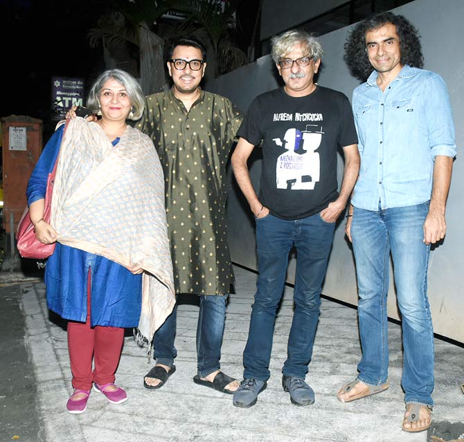Dinesh Vijan poses with Pooja Ladha Surti, Sriram Raghavan and Imtiaz Ali post his Diwali pooja.