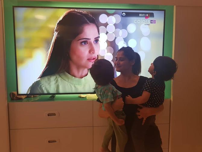 Arti Singh, who entered Bigg Boss 13, was being linked to fellow housemate Sidharth Shukla. Buzz was that the two are in a relationship but haven't made it official yet.
Pictured: Arti smiles as her nephews watch her on TV in her show Udaan. 