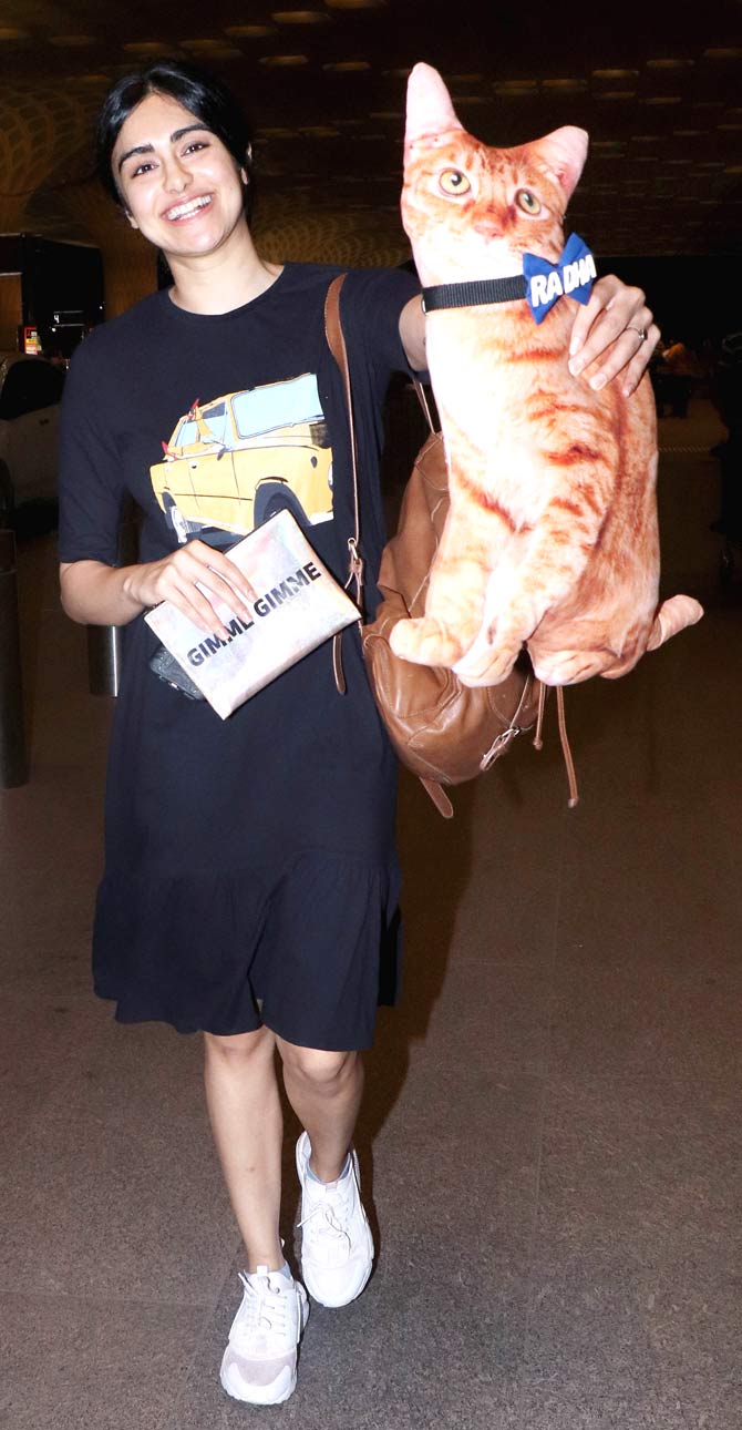 Adah Sharma was all smiles when spotted at the Mumbai airport by the paparazzi.