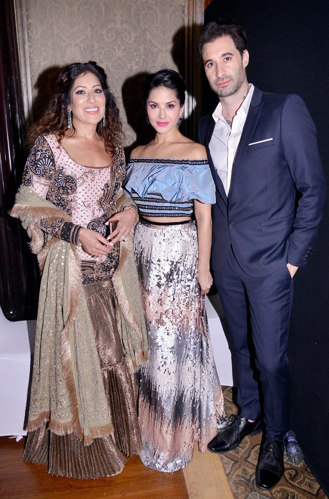 Also seen at the fundraiser were Sunny Leone and husband Daniel Weber. Sunny was stunning as always in a sparkly silver skirt and sky blue crop top, while Daniel looked stylish in a navy blue suit.