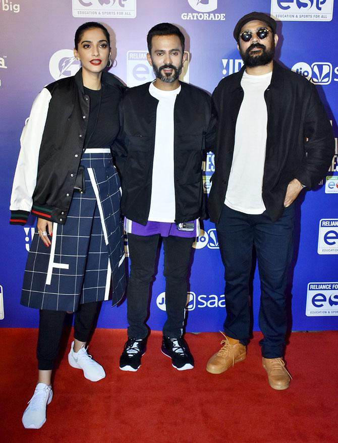 The children, who came to the arena representing the Reliance Foundation Junior NBA program, were specially invited by Nita Ambani, chairperson of Reliance Foundation as part of its celebration of a successful 6 years partnership with the NBA in India
In picture: Sonam Kapoor Ahuja, Anand Ahuja and Karan Boolani