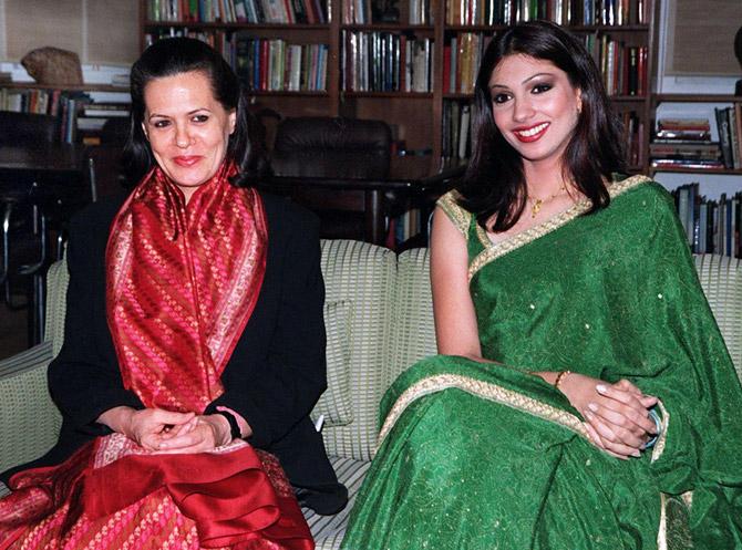 In 2008, Yukta Mookhey married Prince Tuli, a Nagpur-based businessman. The couple, who are now divorced, has a son Ahhrein Tulli, who was born in November 2010.
In picture: Miss World Yukta Mookhey (R) meets India's main opposition leader Sonia Gandhi at her residence in New Delhi on December 23, 1999. The 20-year-old Mookhey said she would work for underprivileged children.