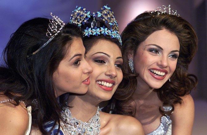 Yukta Mookhey studied at V.G. Vaze College, Mulund. She has a degree in Zoology.
In picture: Yukta Mookhey poses after winning the Miss World title. Miss Venezuala Martina Thorogood (R) was runner-up and Miss South Africa Sonia Raciti (L) was the second runner-up. Yukta Mookhey beat 93 other contestants from around the world.