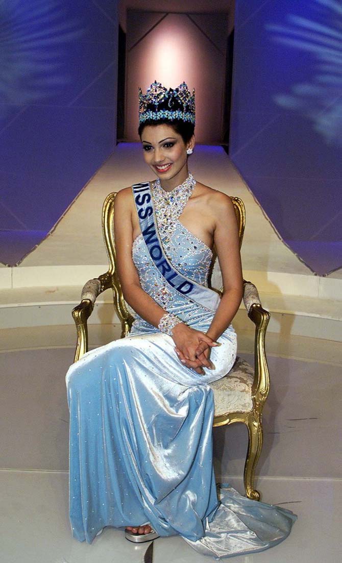 Yukta Mookhey studied in U.A.E. for seven years, as her family moved to the country. However, later her family moved back to Mumbai.
In picture: Miss India Yukta Mookhey, 20, takes the throne after winning the Miss World title in London December 4, 1999.