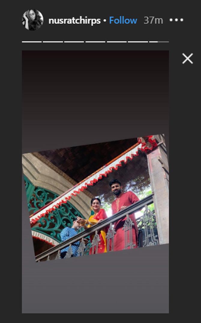 Post Ashtami celebrations, Nusrat shared this picture as her Insta story and was seen twinning in shades of red with hubby Nikhil Jain