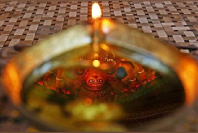 In picture: MP Nusrat Jahan shared this stunning picture which she clicked at the Durga Puaj celebrations on Ashtami at the Suruchi Sangha Pandal in Kolkata. In the picture, the refection of Goddess Durga can be seen in the lamp (diya)