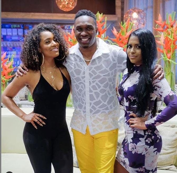 Dwayne Bravo shared this photo and captioned it, 'Very proud of these two young ladies who came to India and gave a great show! They represented our country of Trinidad and Tobago! It was a great experience for all of us, being able to share some of our culture with the people of India. As usual the love and support was great I will continue to fly the flag high and bridge the gap between our cultures where talent is concerned! @djanamusic @arielle.alexa #championtour #champion'