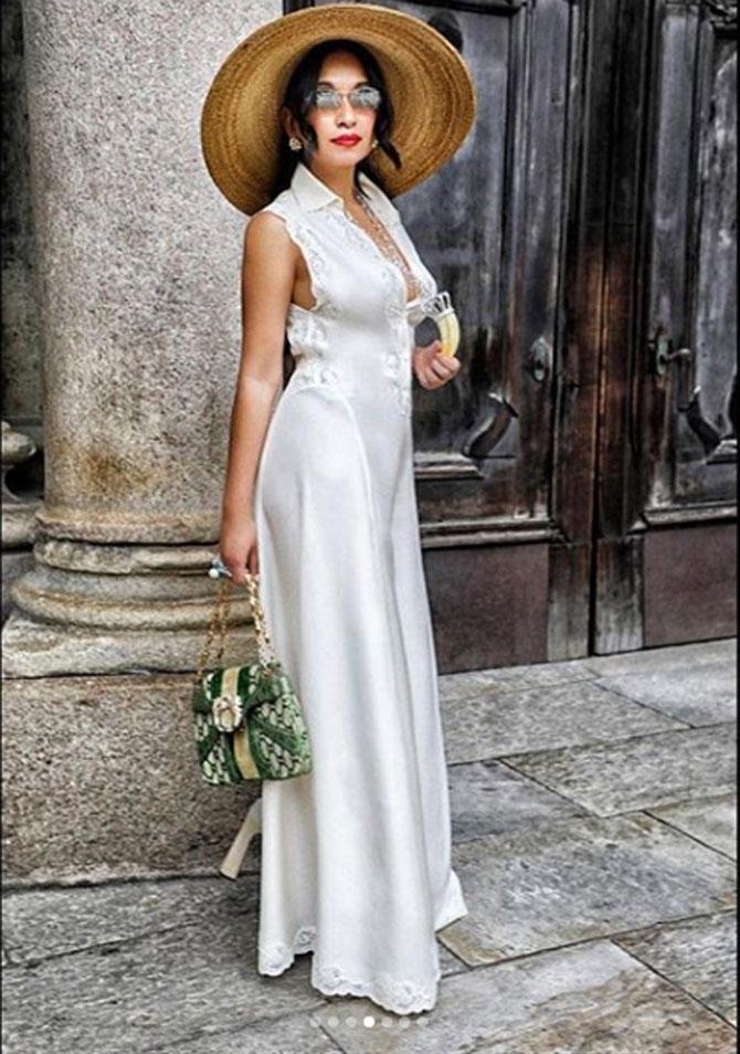 Sheetal Mafatlal wore an all-white ensemble with a green bag, white heals and a hat to a wine-tasting event.
