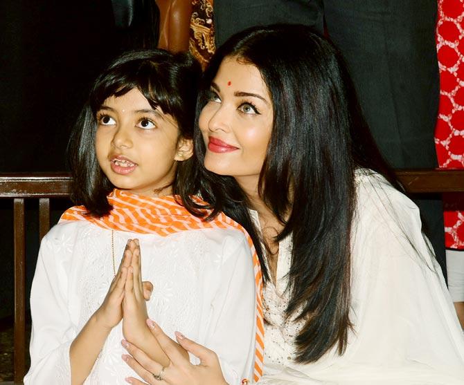 On the work front, Aishwarya Rai Bachchan has dubbed for Angelina Jolie in the Hindi version of Maleficent: Mistress of Evil. Directed by Joachim Ronning, the film is all set to open in cinemas on October 18, 2019.
In picture: Aishwarya Rai Bachchan with daughter Aaradhya at the Durga Puja Pandal in Juhu.