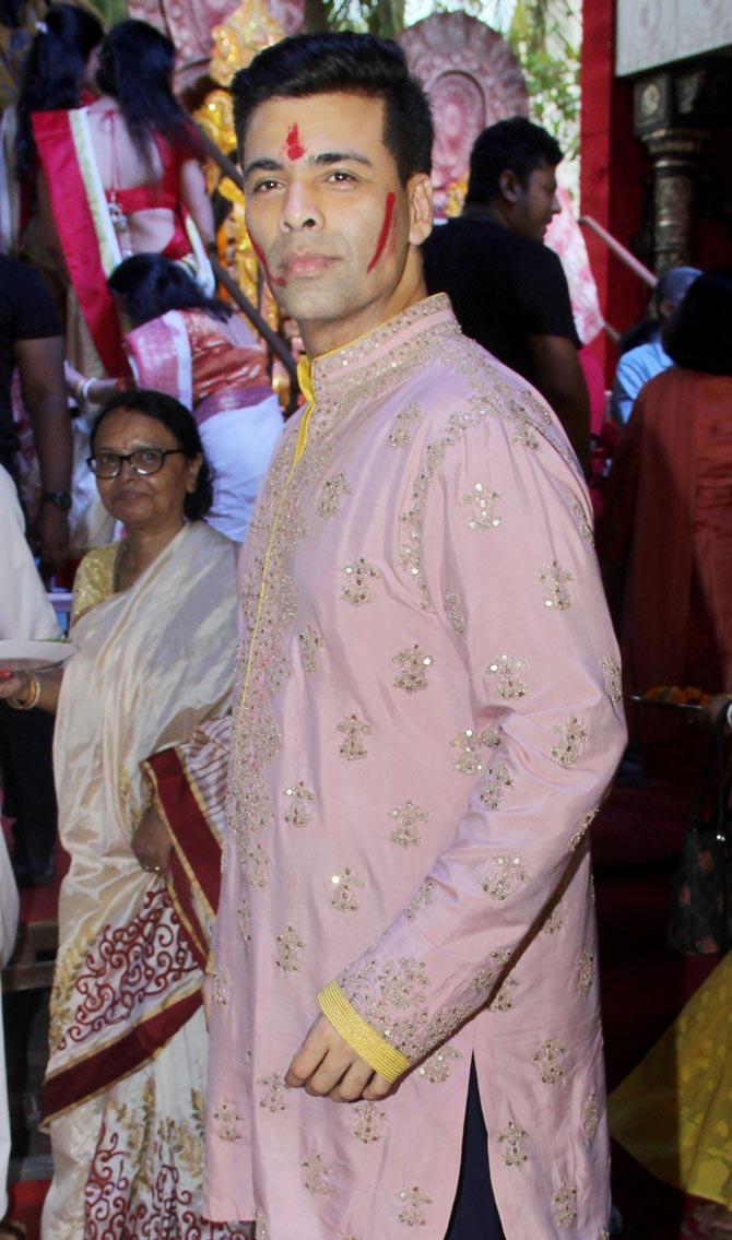 Karan Johar also attended the Durga Puja festivities at the North Bombay Sarbojanin Durga Puja Samiti Pandal in Juhu. KJo looked dapper in his traditional attire.