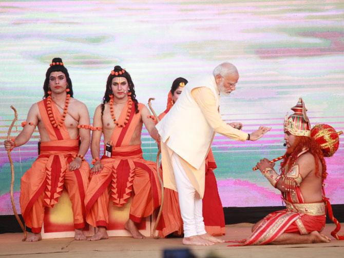 Narendra Modi applied 'tilak' on the forehead of participants playing the role of Ram, Sita and Lakshman at the stage. The 107-ft effigy of the demon king Ravana and those of Kumbhakarna and Meghanad were prepared with green crackers, said chairman of Dwarka Sri Ramleela Society Rajesh Gehlot