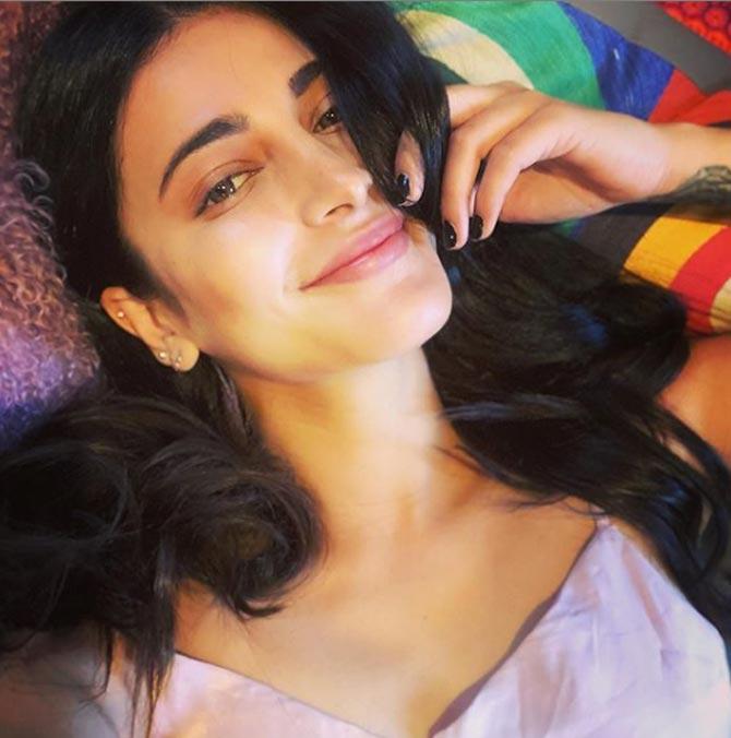 Shruti Haasan lived in an open and friendly environment during her school days and she even confessed that it helped her to develop her love for music. Shruti's love for music made her a stronger person. In fact, Shruti's school encouraged all students to pursue their interests, and that's how she could pursue a career in singing.
