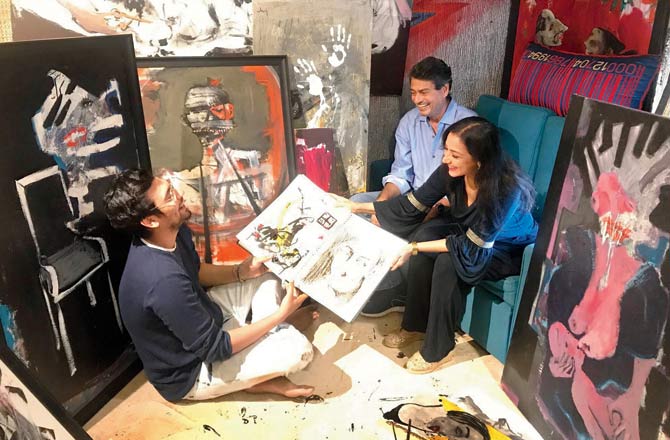 (Left) Aditiya Singh with his parents