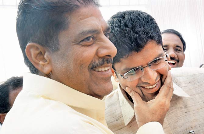 Ajay Chautala with Dushyant after the ceremony. Pic/PTI 