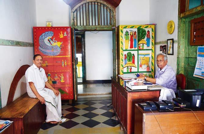Keshava Acharya (left), supervisor for 50 years at New Vasantashram, with manager Jagannath Shetty, in the lodge