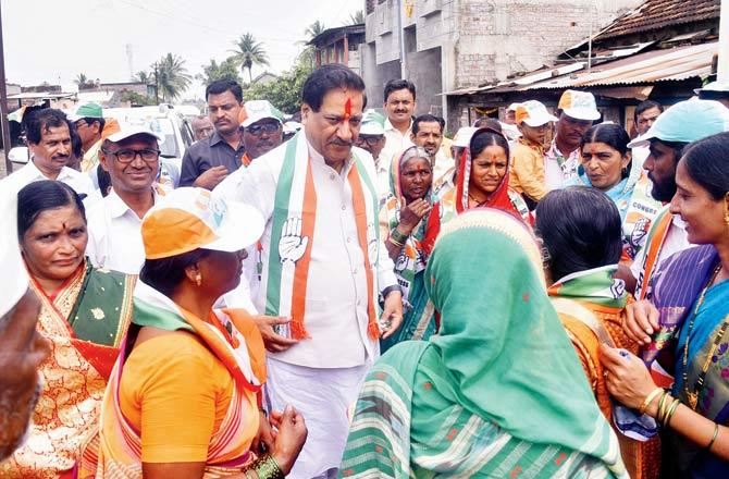 Former chief minister and Congress candidate Prithviraj Chavan campaigns in Karad