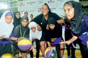 Ebony Hoffman: National Basketball Association will take over India Former WNBA star Ebony Hoffman (centre) with the girls from the Reliance Foundation Jr NBA in Parel yesterday. Pic/ Sayyed Sameer Abedi