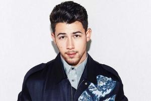 Nick Jonas gets groped by a fan during Los Angeles concert