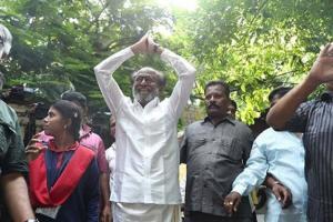 Superstar Rajinikanth greets his fans outside his residence on Diwali
