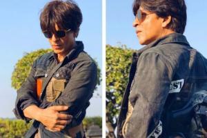 Karan Johar gifts Shah Rukh Khan a jacket, his reaction is priceless