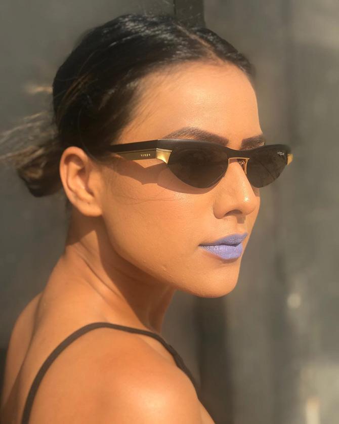 Here's the fierce actress flaunting purple lipstick! The television diva is often seen experimenting with her lip colours, which are always met with mixed comments from her fans and social media followers. 
