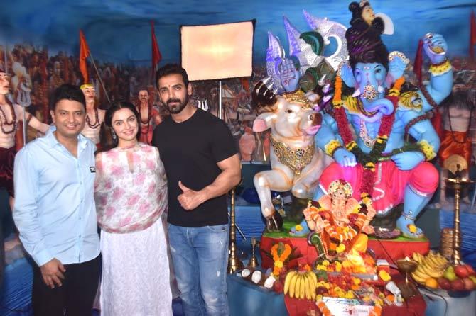 Kajal Aggarwal's Mumbai Saga co-star John Abraham also came to seek Bappa's blessing at T-Series Office in Andheri.
In picture: John Abraham poses with Bhushan Kumar and Divya Khosla Kumar at the Ganpati Pandal.