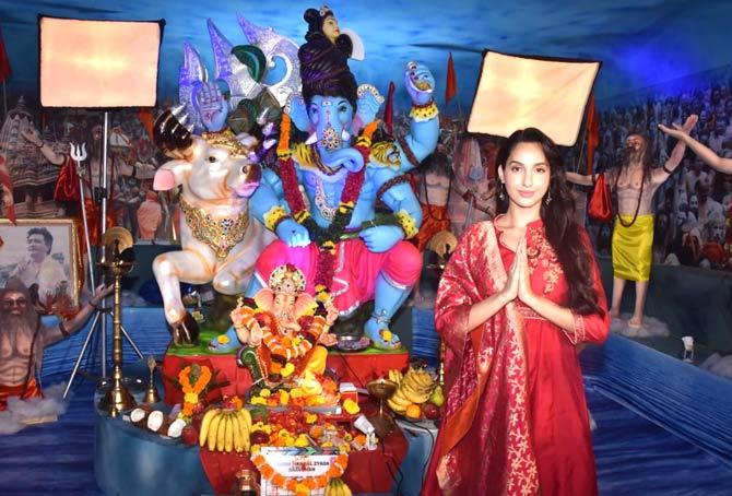 Nora Fatehi looked elegant in her traditional attire as she came in to seek Bappa's blessing at T-Series' Ganpati pandal at their office in Andheri.