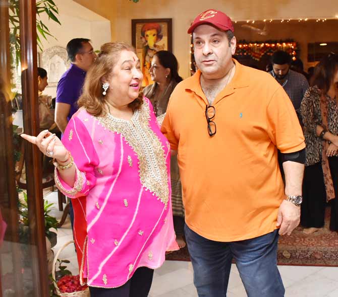 Karisma Kapoor, who is a maternal aunt to Taimur Ali Khan, also shared a few snippets from the family get together. In one of the videos, the tiny tot was also seen screaming 'Mangal Murti Morya' with Armaan Jain.
In picture: Rima Jain with brother Rajiv Kapoor during the visarjan.