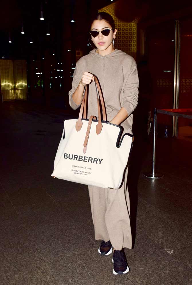 Anushka Sharma picks a quirky green shirt for her airport look, her bag  worth Rs 2.71 lakh saves the look - WATCH