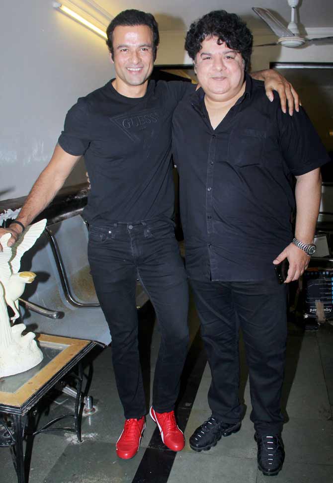 Armaan Kohli's father Rajkumar Kohli turned 89 years old on September 14, and the family hosted a small bash for their industry friends in Juhu, Mumbai. All pictures/Yogen Shah
In picture: Rohit Roy and Sajid Khan posed for the shutterbugs as they arrived at the birthday bash.