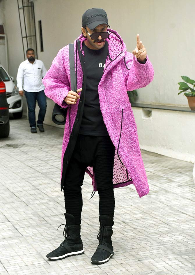 Ranveer Singh was dynamic as usual when he was snapped by the paparazzi. The Padmaavat actor was fab in a pair of black pants, a black tee. and a long pink jacket.