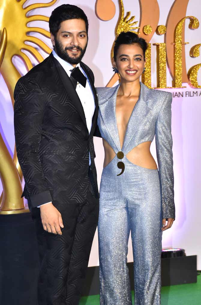 The 20th edition of the NEXA IIFA Awards will be hosted by the talented duo - Arjun Kapoor and Ayushmann Khurrana.
In picture: The hosts of the show, Radhika Apte and Ali Fazal posed for the shutterbugs together at the green carpet. While Ali Fazal suited up, Radhika opted for an ombre jumpsuit for the evening.