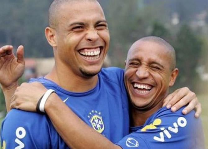 In picture: Ronaldo and his Brazilian teammate Roberto Carlos share a hearty laugh.