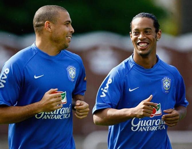 In picture: Ronaldo with another former Brazil star player Ronaldinho during a training session.