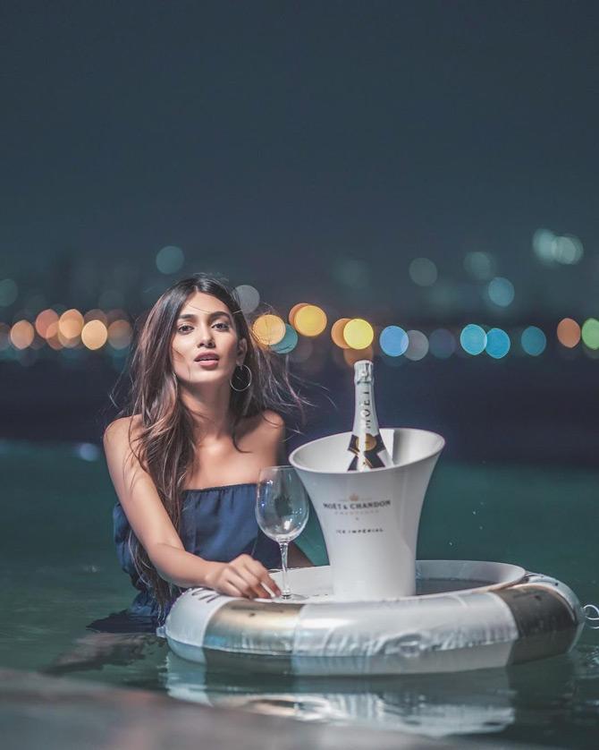 In picture: Vaishnavi Andhale, who is seen enjoying champagne by the pool gets cheeky with this post of hers. While sharing the pic, Andhale writes: Let's get drunk, make mistakes and blame it on the alcohol!!