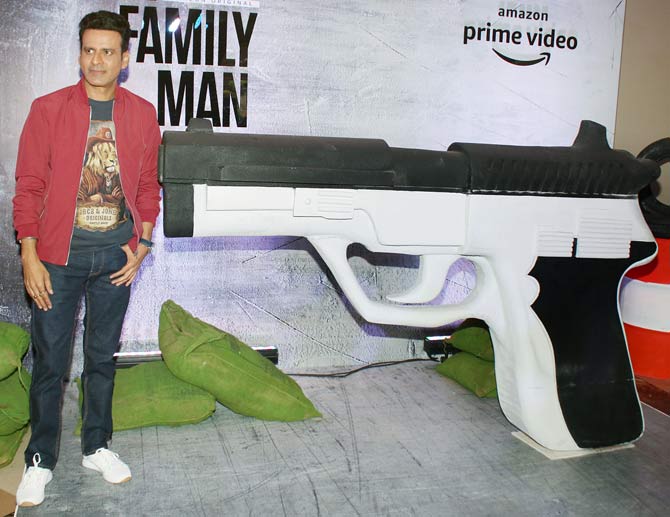 The entire team of The Family Man, an upcoming web show, were snapped promoting their digital drama in Juhu, Mumbai. Manoj Bajpayee, Priyamani, Gul Panag and the entire cast attended the event hosted in the city. All pictures/Yogen Shah
In picture: Manoj Bajpayee posed for the shutterbugs at the promotional event in the city.
