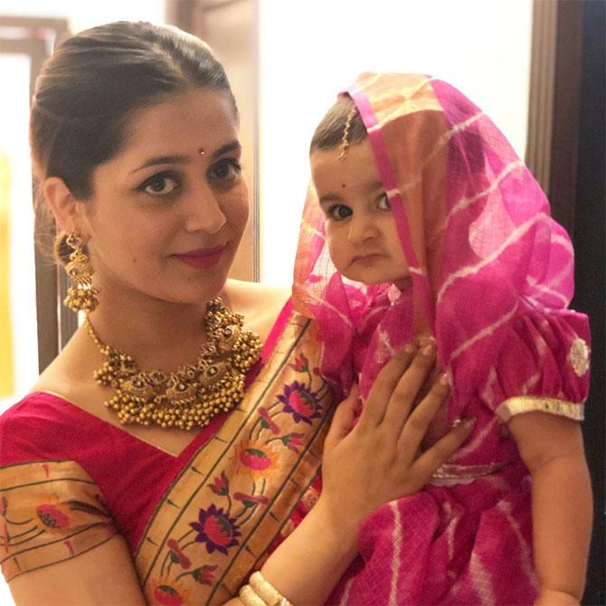 Nurvi has the sweetest, most innocent face, and the way she stares into the camera is just cuteness overload.
In picture: Rukmini Sahay with daughter Nurvi in a traditional attire.