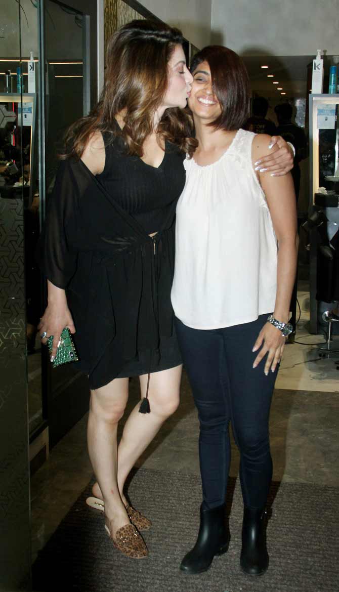 Urvashi Rautela was last seen on the big screen in Hate Story 4 (2018). She will next be seen in Pagalpanti alongside Anil Kapoor, John Abraham and Ileana D'Cruz.
In picture: Urvashi Rautela gives a peck on the cheek of her friend as she poses for the photographers at the Bandra eatery.