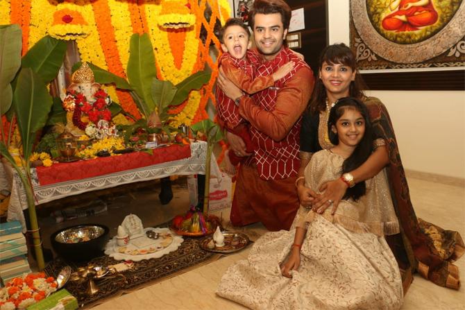 Television host and actor, Maniesh Paul looks happy with his family in this picture-perfect frame with 'bappa.' He shared a photograph with wife Sanyukta Paul and Lord Ganesha in the frame to extend wishes to his fans and followers. He wrote: 