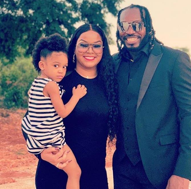 In picture: Chris Gayle with his partner Natasha Berridge and daughter Kris-Allyna