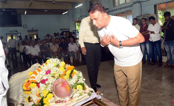 In picture: Sunil Gavaskar pays his last respects to Madhav Apte during the funeral