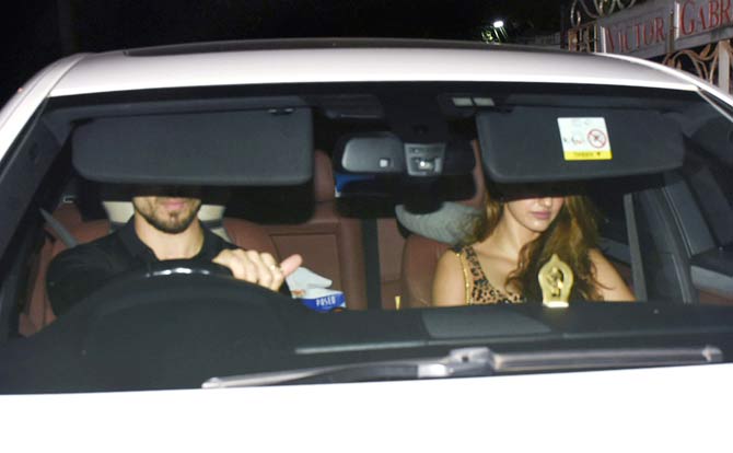 Tiger Shroff's sister Krishna seems to have put rumours to rest. As a guest on the Nothing To Hide segment of the show, By Invite Only, she spoke about being open about relationships.
In picture: Tiger Shroff and Disha Patani used the sun visor to hide their face as they left from the restaurant in Juhu.