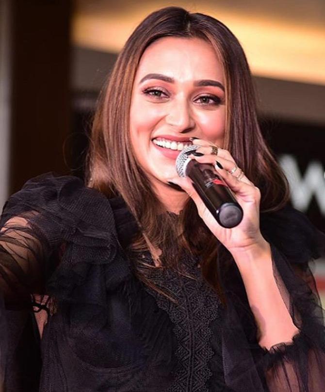 Bengali actress and MP Mimi Chakraborty who won during the 2019 Lok Sabha elections from Jadavpur Lok Sabha constituency in West Bengal as a Trinamool Congress (TMC) candidate is a popular personality. The 30-year-old actor-turned-politician from West Bengal has been setting the internet on fire with her stunning pictures and Mimi has a huge liking for the colour black. Mimi's Instagram is filled with pictures from western wear to ethnic ensembles all in different shades of black
In photo: Mimi Chakraborty in a gorgeous black outfit interacts with her fans 
