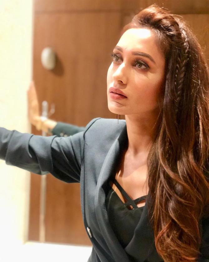 The actress-turned-politician looks poised and poignant as she shines in a black top paired with a black blazer. Mimi Chakraborty captions this one: Today (suit woman)