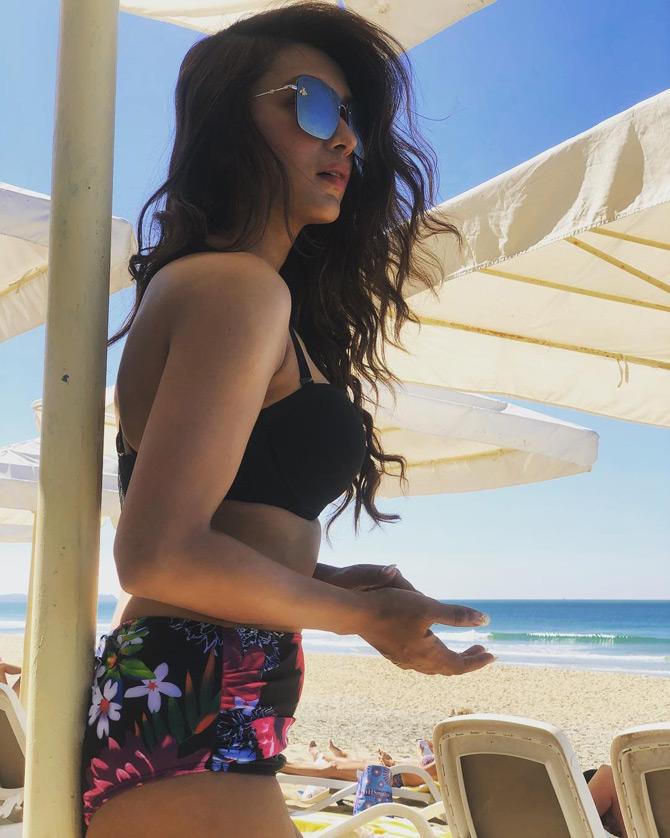 Mimi Chakraborty is a beach person and in the picture, the doe-eyed actress raises the temperature in a two-piece black bikini swimsuit as she looks stunning in a no-makeup look. Leaving her long tresses open, Mimi looks beach-ready as she captions the pic: I see SEA!