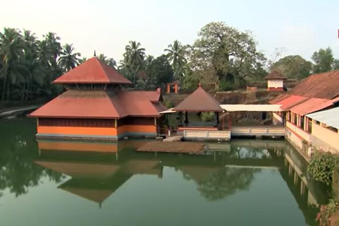 Ananathpura Lake Temple, Kerala: The Ananathpura Lake Temple is built in the middle of a lake in the little village of Ananthapura in the district Kasaragod of Kerala. The temple reportedly has a vegetarian crocodile called Babiya who is believed to consume only the prasad of the temple which is a mixture of rice and jaggery. Babiya lives in the pond surrounding the temple and is said to be harmless. It is also said that fishes are safe in the pond as Babiya doesn't eat them