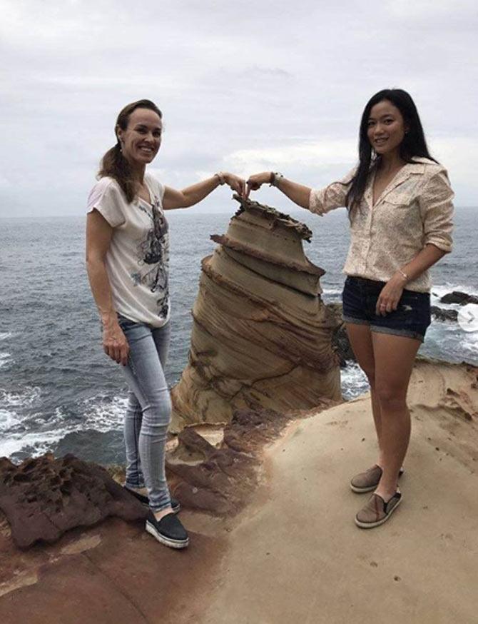 Martina Hingis and Latisha Chan pose during one of their outings. Hingis captioned it, 'had a lot of fun exploring Jiufen Old Street and Nanya sandstones. ready for more adventures today! #vacationintaiwan