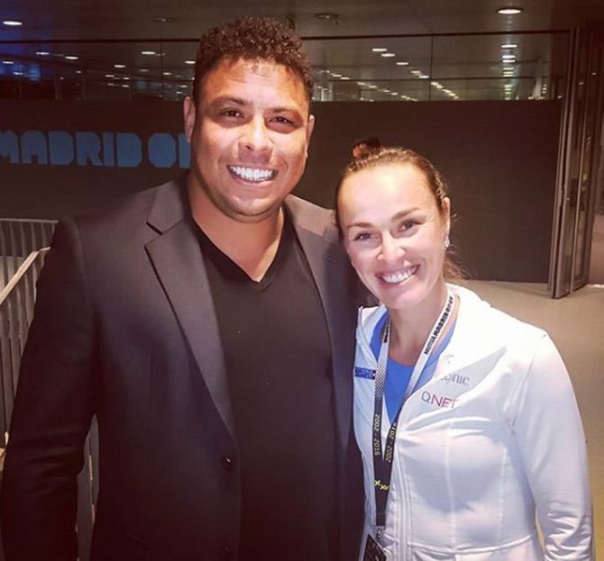 Martina Hingis shared this photo with Brazilian football legend Ronaldo and captioned it, 'look who I came across in the corridors of the @MutuaMadridOpen! soccer legend Ronaldo the original!'
