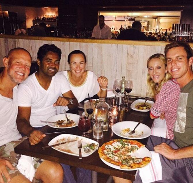 Martina Hingis shared this photo with Leander Paes and the team during a dinner captioning it, 'Finishing the day with dinner in Austin... @washkastles @murphyjensen @leander @arodionova'