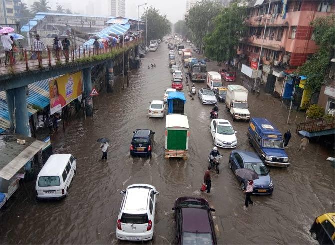 Intense rainfall disrupted not only the railway services but also road causing traffic and commuters stranded in the flooded areas of the city.
In picture: Matunga west starts to waterlog due to hours of incessant downpour on Wednesday
(Picture courtesy/Ashish Raje)
 